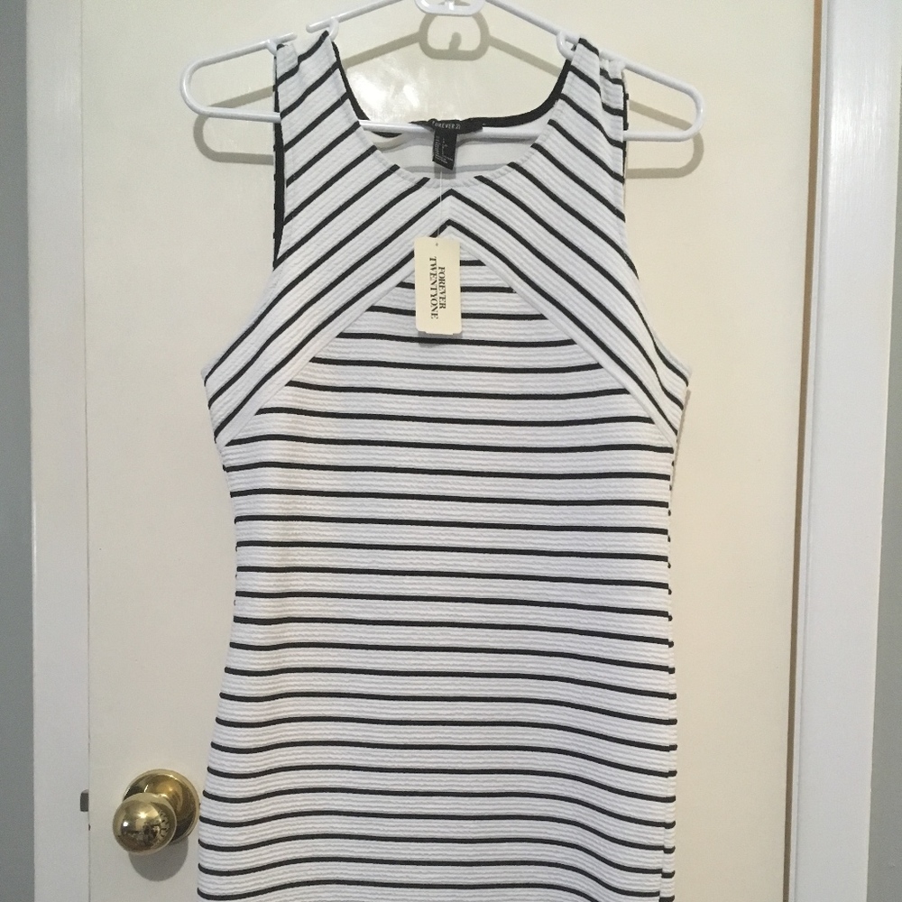 Sleeveless black and white mini dress